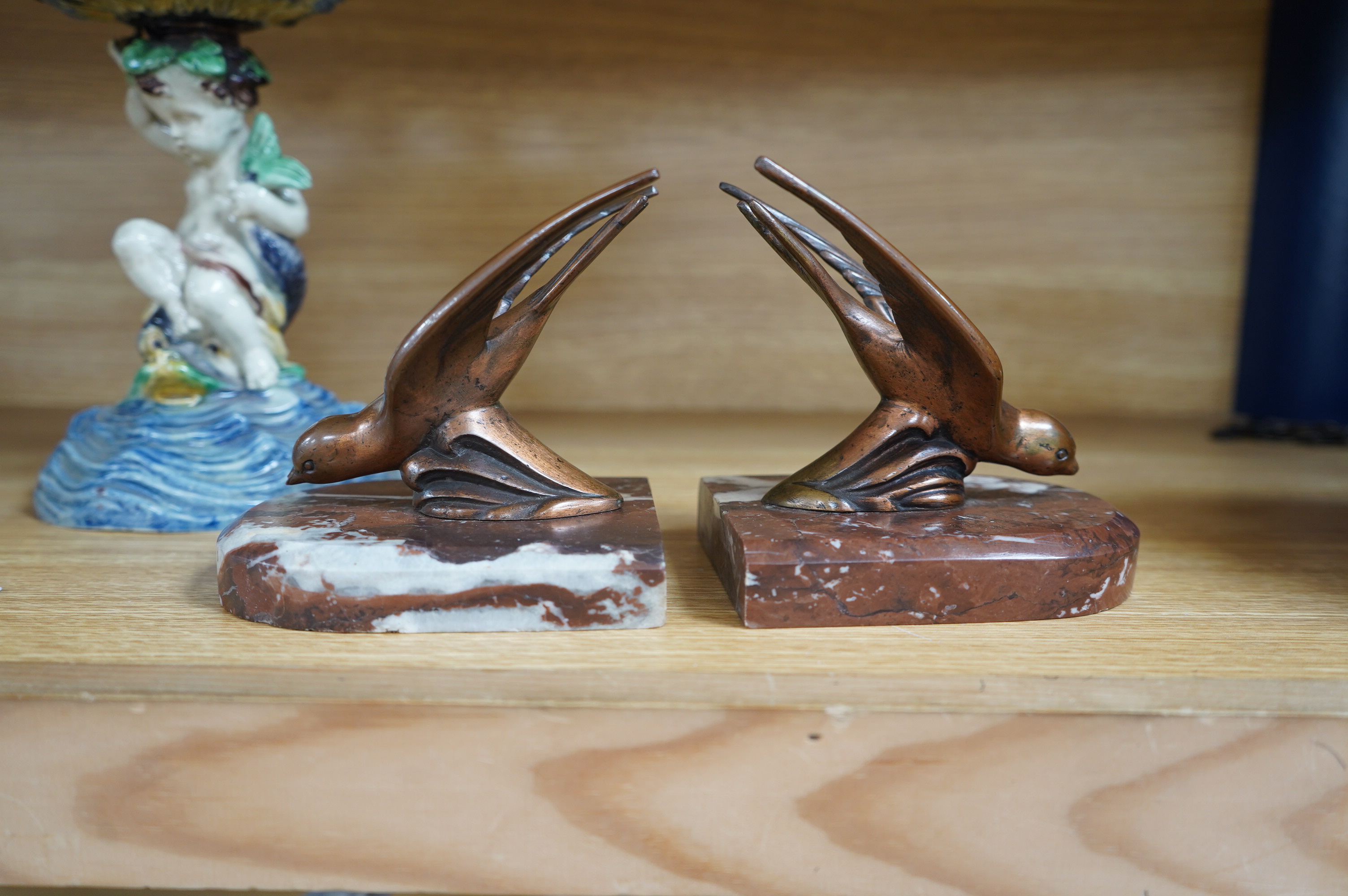 A pair of French Art Deco bronze bird bookends, 12cm. Condition - fair